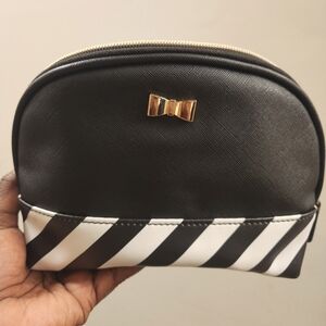 Crossing Beauty Travel Bag in b&w with gold hardware